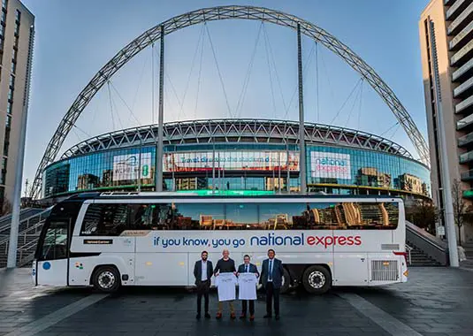 National Express Bus In Front Of A Stadium